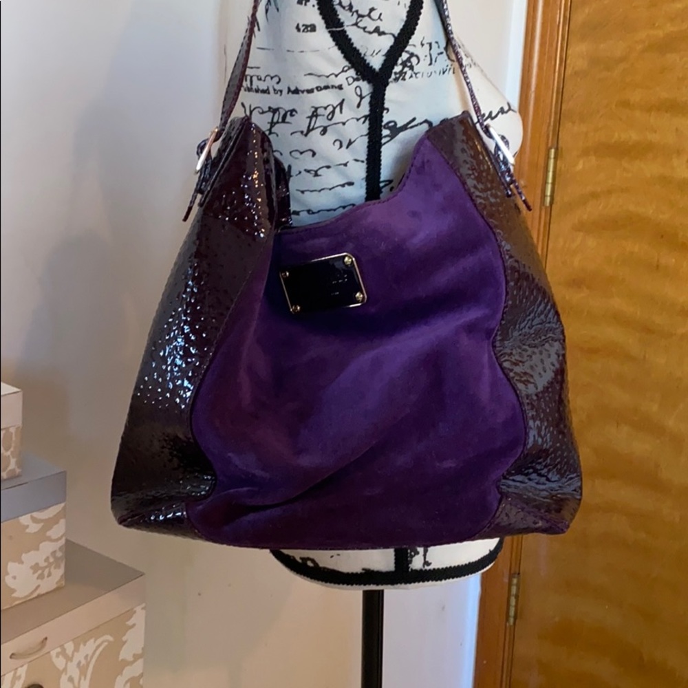 Purple Kate Spade leather and suede handbag